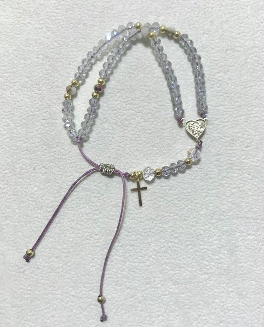 Pulsera Rosario celeste.