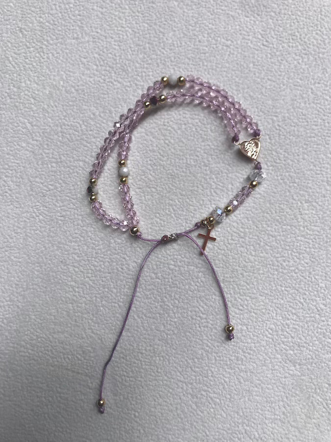 Pulsera Rosario rosada.